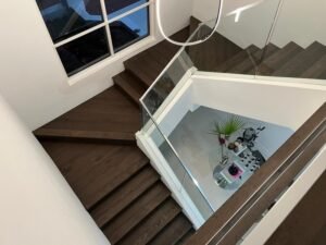 Luigi dark brown hard wood floor in stairs